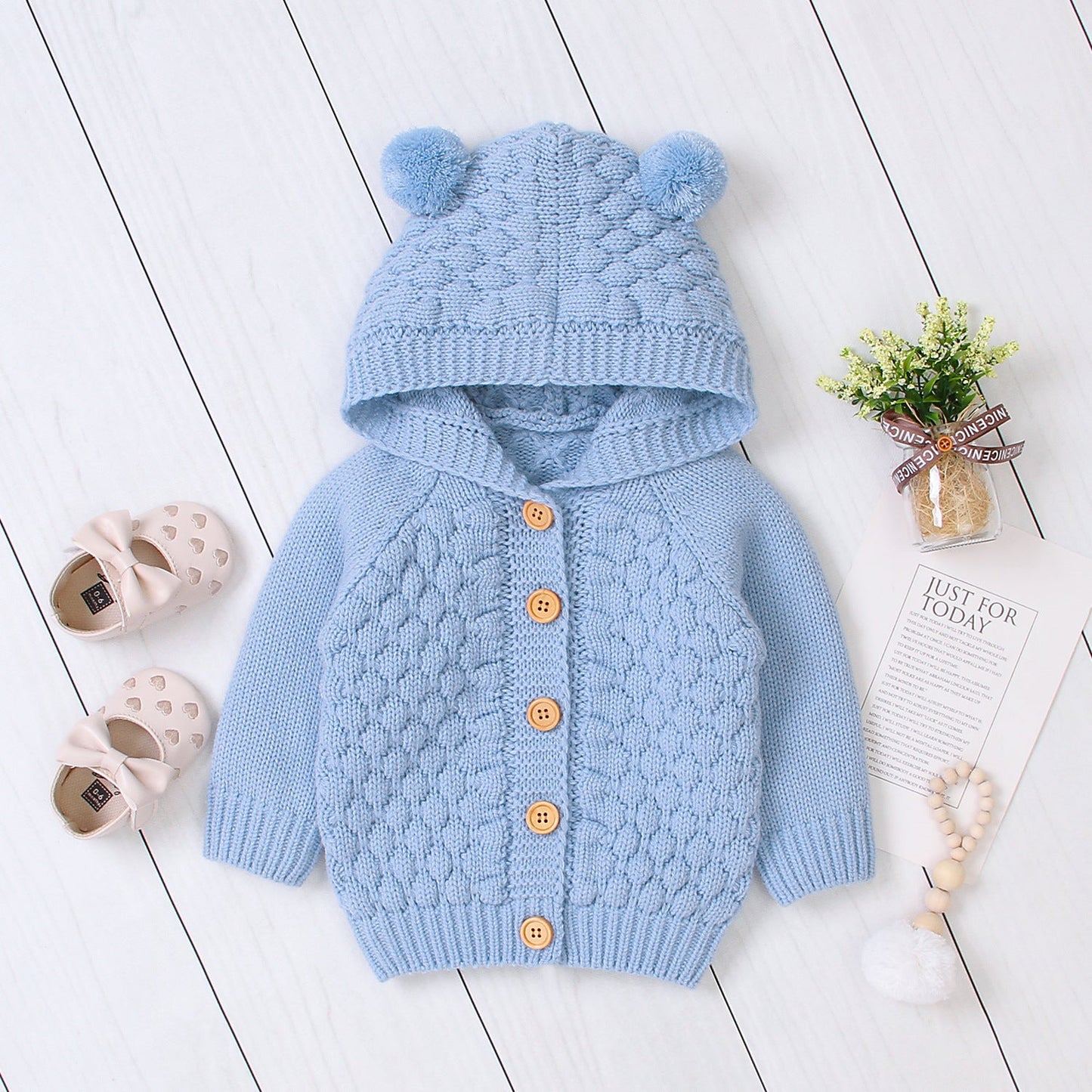 Wool ball hooded knitted jacket