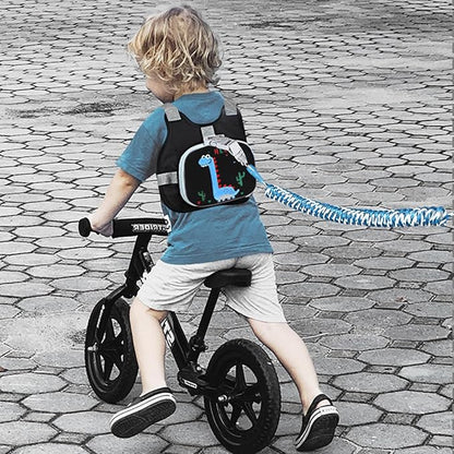 Accmor Toddler Harness Leash+ Reflective Anti Lost Wrist Link, Cute Dinosaur Kids Harness with Leash, Foldable Child Harness Baby Leash Boys Walking Wristband Assistant Belt for Outdoor Travel