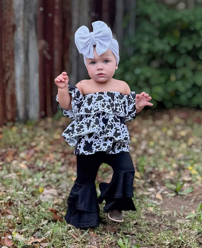 Cow print ruffle top